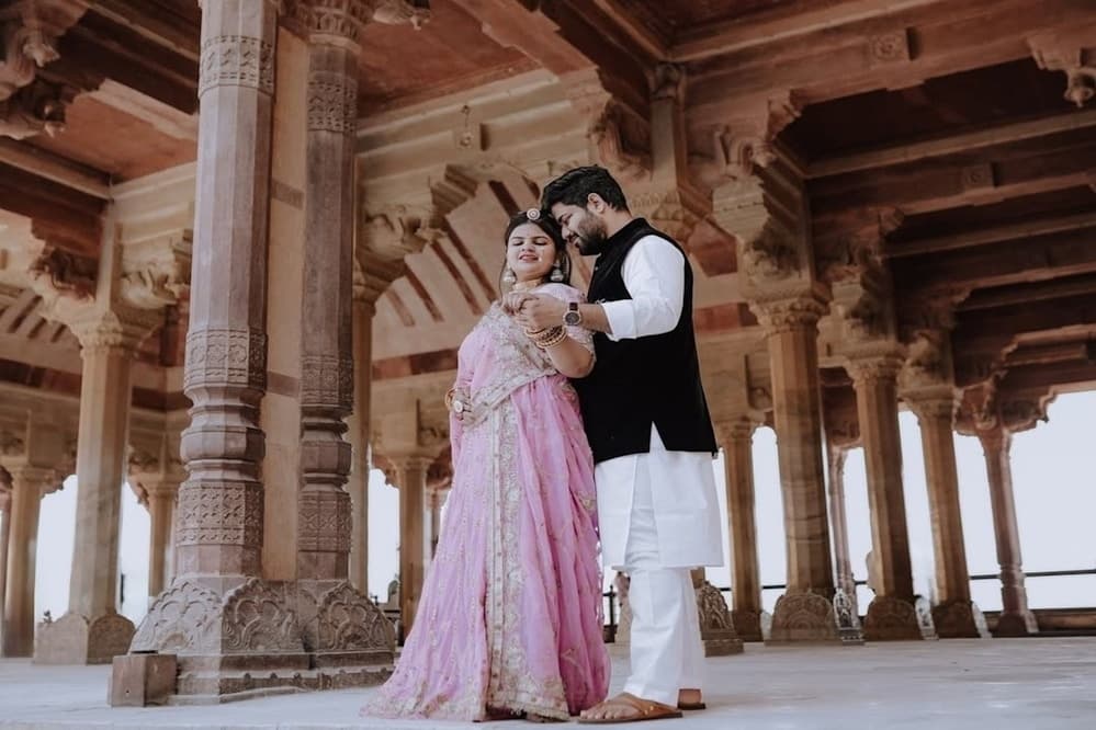 Engagement portraits on rocky cliffs by the ocean