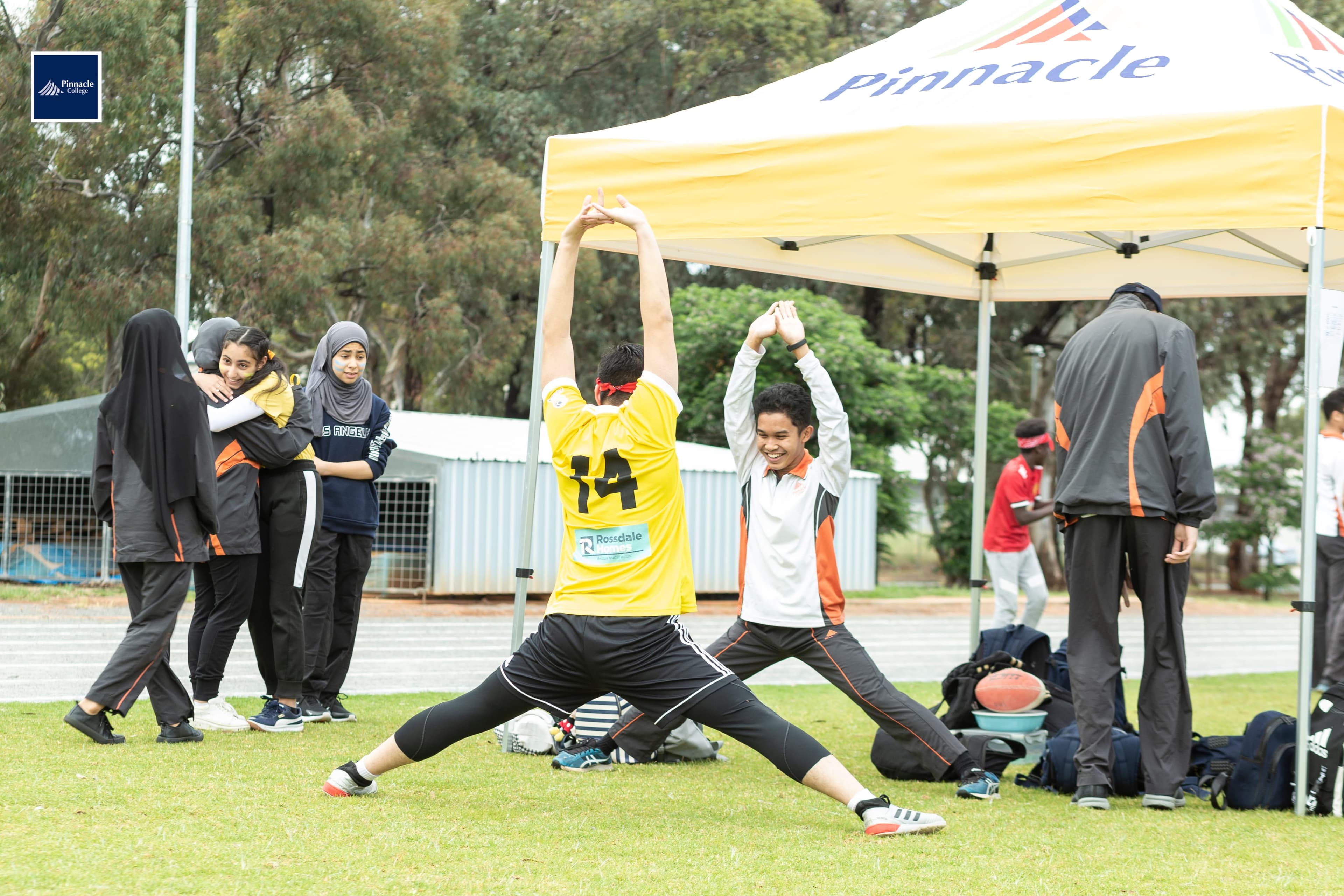 Students posing for school photos on campus